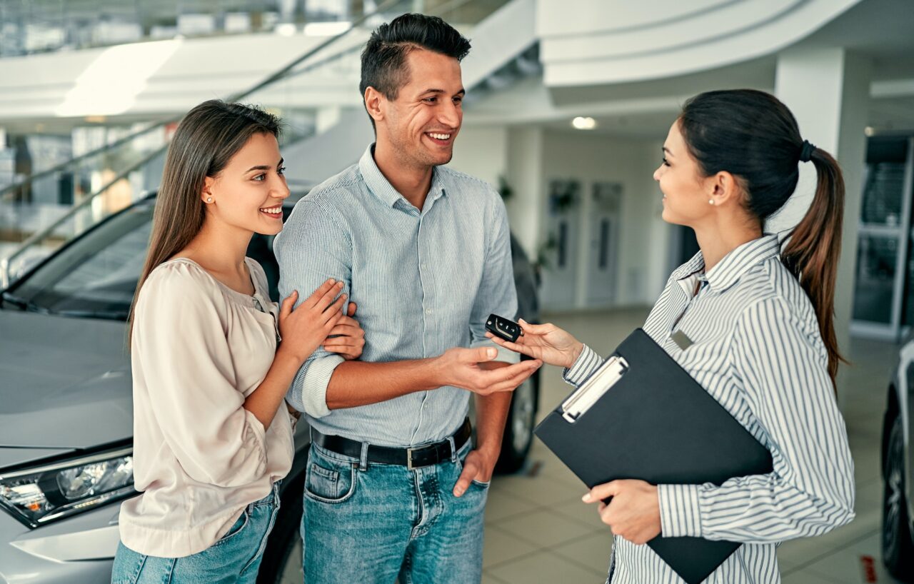 At a car dealership, buying a car